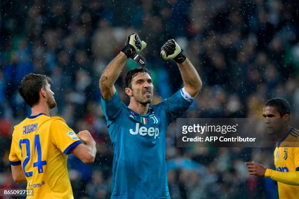 Juventus' Italian goalkeeper Gianluigi Buffon gestures after victory in the Italian Serie A football match Udinese vs Juventus at the Friuli stadium...
