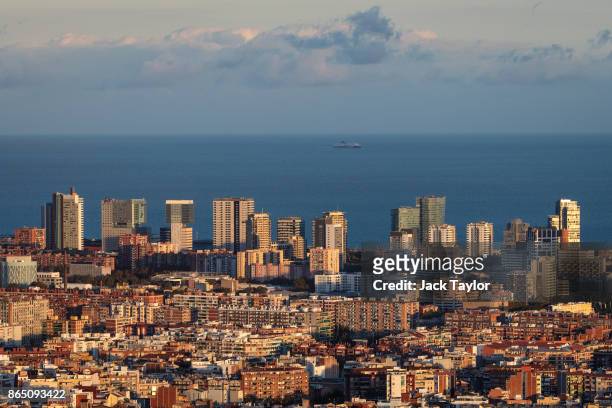 The sun sets over the city on October 22, 2017 in Barcelona, Spain. The Spanish government is to take steps to suspend Catalonia's autonomy by...