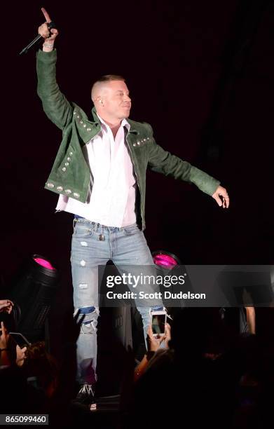 Rapper Macklemore performs onstage during the 5th annual "We Can Survive" benefit concert presented by CBS Radio at the Hollywood Bowl on October 21,...