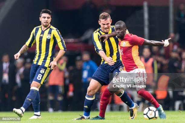 Ozan Tufan of Fenerbahce SK, Vincent Janssen of Fenerbahce SK, Papa N'Diaye of Galatasaray SK during the Turkish Spor Toto Super Lig football match...