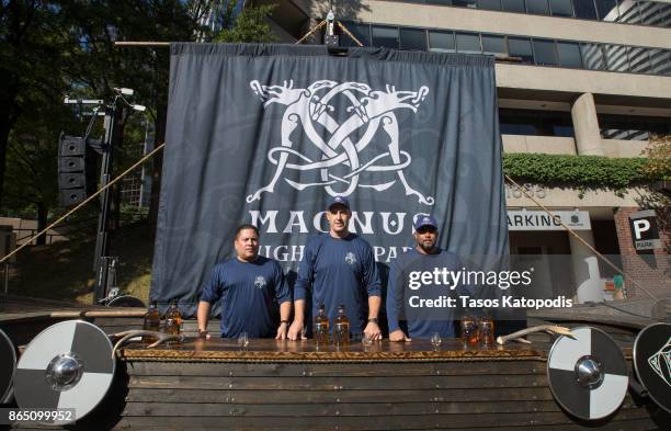 Retired Major Shawn Poulin, Troy Drake, former Philadelphia Eagles, Washington Redskins Former Marine Gunnery Sergeant Andre Joseph at the Highland...