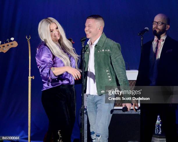 Singers Kesha and Macklemore perform onstage during the 5th annual "We Can Survive" benefit concert presented by CBS Radio at the Hollywood Bowl on...