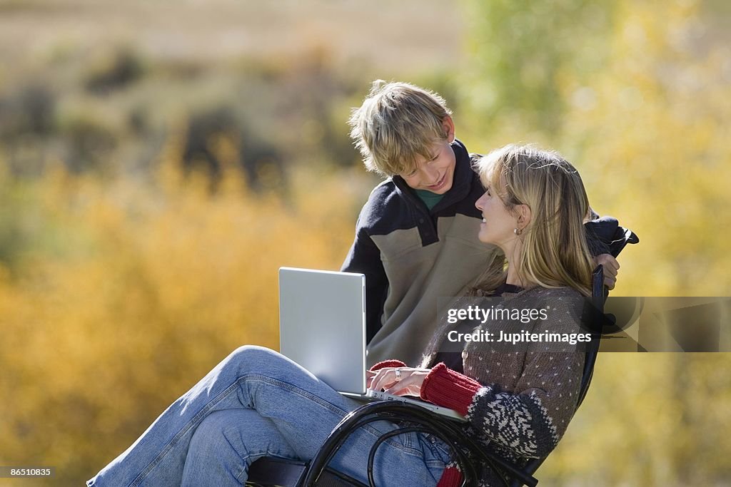 Mother and son with a laptop computer