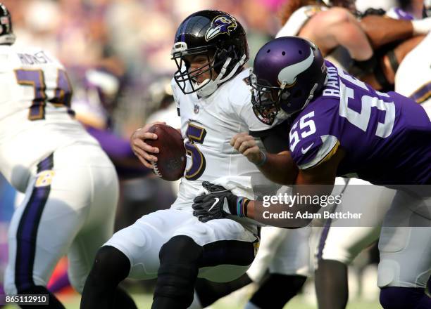 Anthony Barr of the Minnesota Vikings sacks Joe Flacco of the Baltimore Ravens in the third quarter of the game on October 22, 2017 at U.S. Bank...