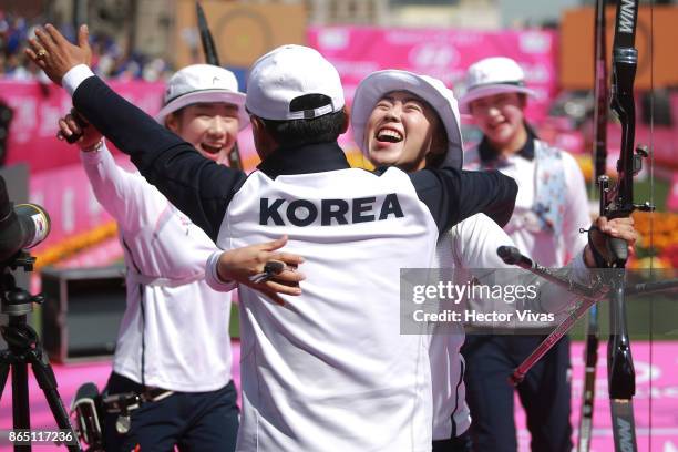 Chang Hye Jin, Choi Misun and Kang Chae Young of Korea celebrate during the Gold: Recurve Women Team Competition as part of the Mexico City 2017...