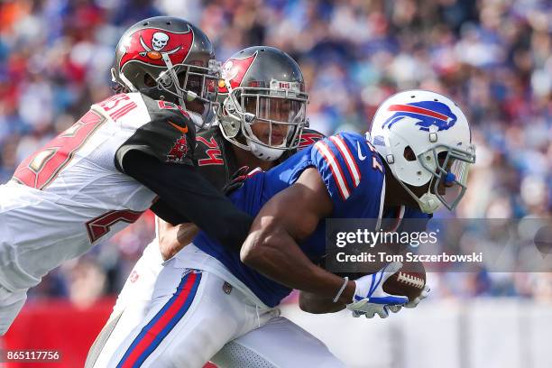 Vernon Hargreaves of the Tampa Bay Buccaneers and Brent Grimes of the Tampa Bay Buccaneers tackle Zay Jones of the Buffalo Bills during the second...