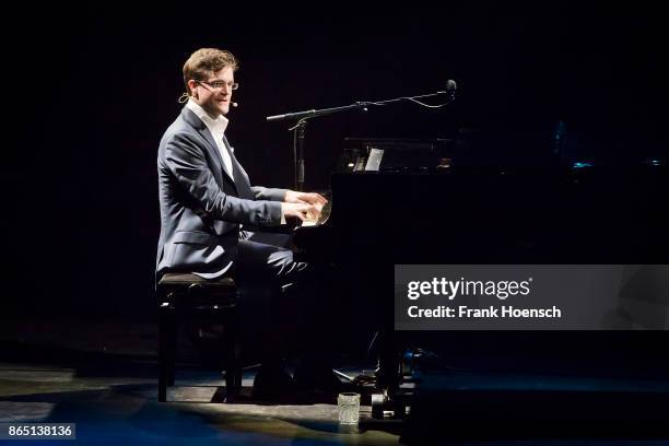 German singer and comedian Bodo Wartke performs live on stage during a concert at the Admiralspalast on October 22, 2017 in Berlin, Germany.