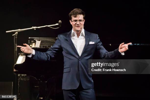 German singer and comedian Bodo Wartke performs live on stage during a concert at the Admiralspalast on October 22, 2017 in Berlin, Germany.