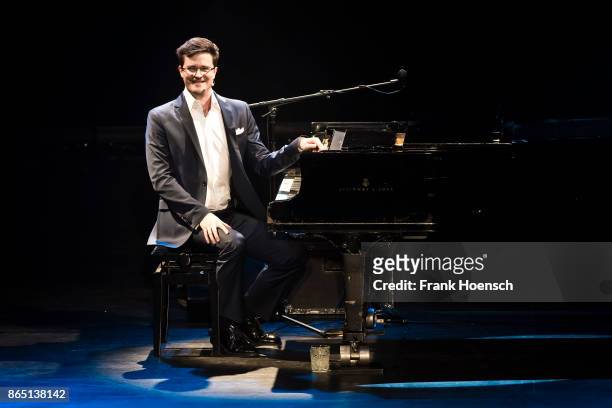 German singer and comedian Bodo Wartke performs live on stage during a concert at the Admiralspalast on October 22, 2017 in Berlin, Germany.