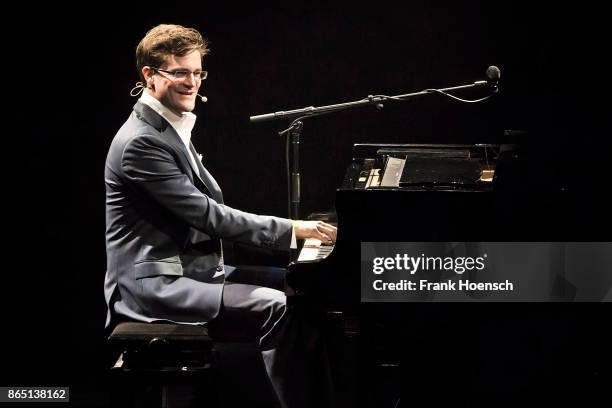 German singer and comedian Bodo Wartke performs live on stage during a concert at the Admiralspalast on October 22, 2017 in Berlin, Germany.