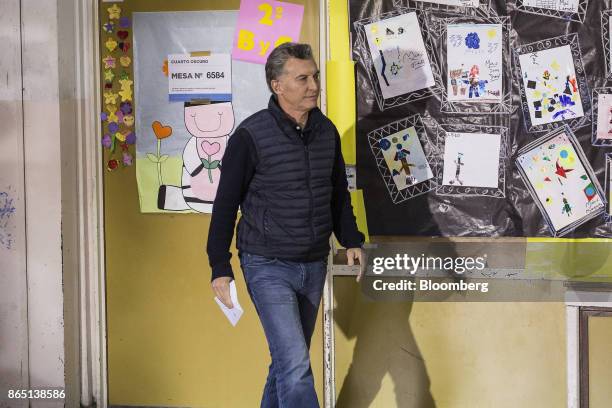 Mauricio Macri, Argentina's president, exits a voting booth before casting a ballot at a polling station in Buenos Aires, Argentina, on Sunday, Oct....