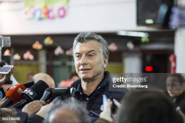 Mauricio Macri, Argentina's president, speaks to members of the media at a polling station in Buenos Aires, Argentina, on Sunday, Oct. 22, 2017....