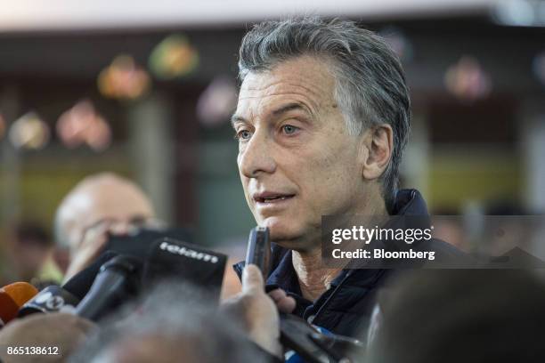 Mauricio Macri, Argentina's president, speaks to members of the media at a polling station in Buenos Aires, Argentina, on Sunday, Oct. 22, 2017....