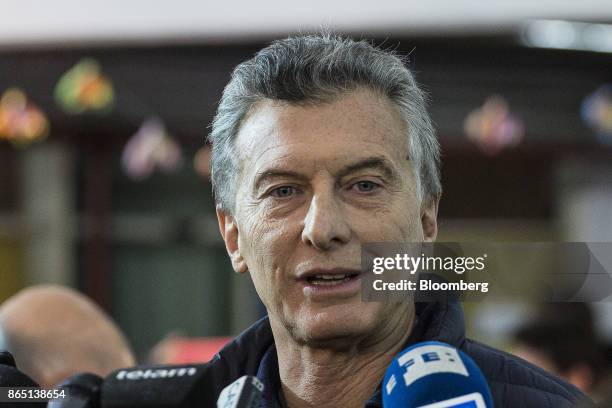 Mauricio Macri, Argentina's president, speaks to members of the media at a polling station in Buenos Aires, Argentina, on Sunday, Oct. 22, 2017....