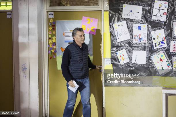 Mauricio Macri, Argentina's president, exits a voting booth before casting a ballot at a polling station in Buenos Aires, Argentina, on Sunday, Oct....