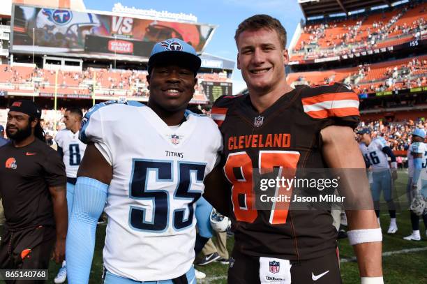 Jayon Brown of the Tennessee Titans and Seth DeValve of the Cleveland Browns pose for a picture after the gameat FirstEnergy Stadium on October 22,...