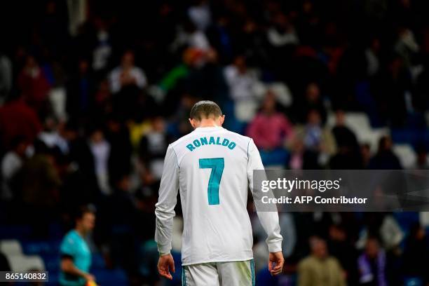 Real Madrid's Portuguese forward Cristiano Ronaldo reacts at the end of the Spanish league football match Real Madrid CF vs SD Eibar at the Santiago...