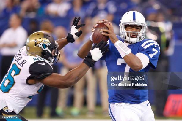 Jacoby Brissett of the Indianapolis Colts is sacked by Dante Fowler of the Jacksonville Jaguars during the third quarter at Lucas Oil Stadium on...