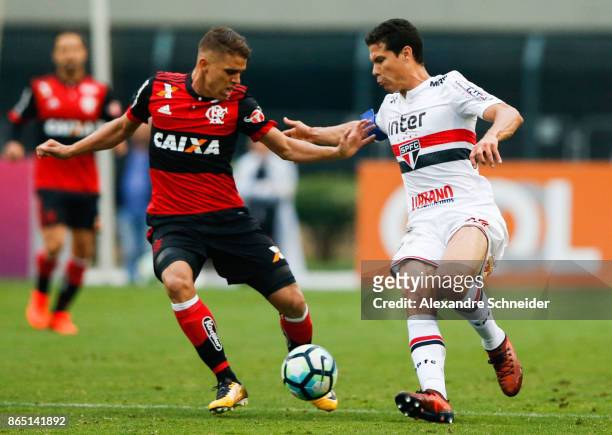Gustavo Cuellar of Flamengo and Hernanes of Sao Paulo in action during the match between Sao Paulo and Flamengo for the Brasileirao Series A 2017 at...