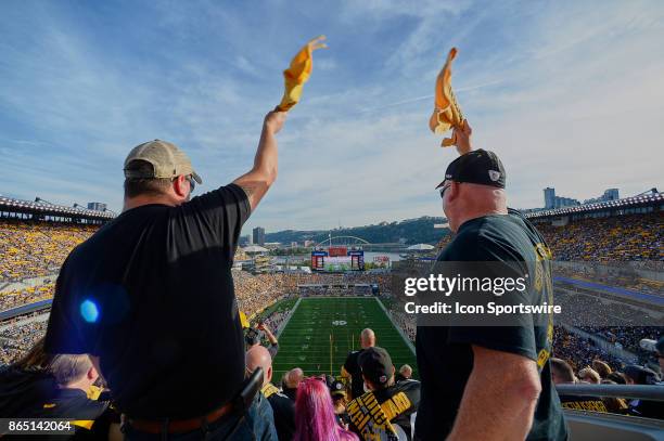 Fans wave the Terrible Towel prior to the NFL game between the Cincinnati Bengals and the Pittsburgh Steelers on October 22, 2017 at Heinz Field in...