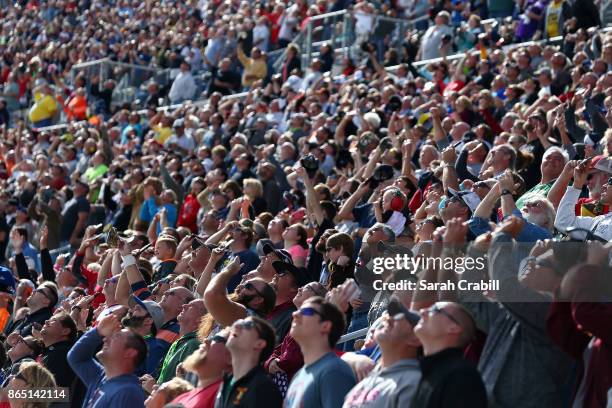 Fans look on prior to the Monster Energy NASCAR Cup Series Hollywood Casino 400 at Kansas Speedway on October 22, 2017 in Kansas City, Kansas.