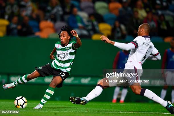 Sporting's forward Gelson Martins challenges Chaves' Brazilian defender Anderson Conceicao during the Portuguese league football match Sporting CP vs...