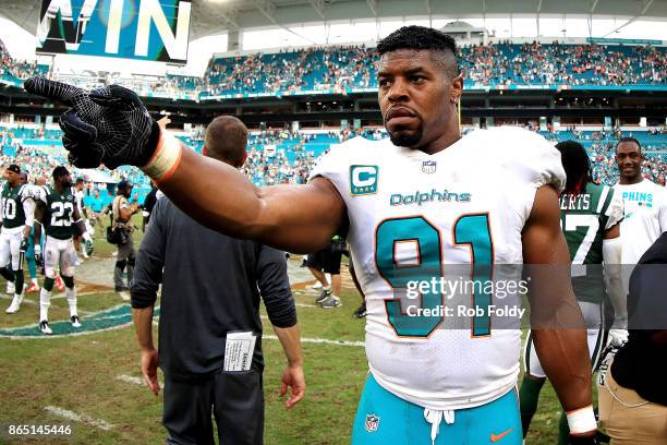 Cameron Wake of the Miami Dolphins celebrates winning the game against the New York Jets at Hard Rock Stadium on October 22, 2017 in Miami Gardens,...