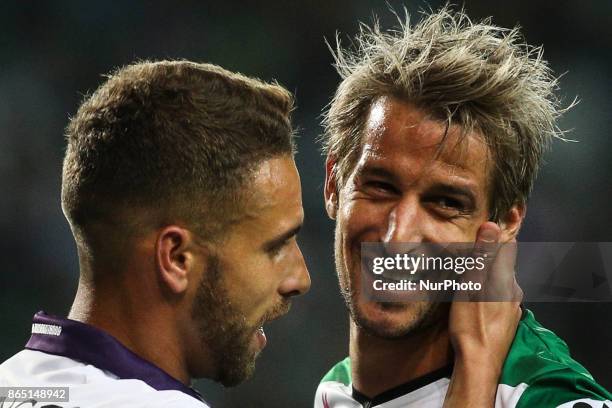 Sporting's defender Fabio Coentrao reacts next to Chaves's defender Paulinho during the Portuguese League football match between Sporting CP and...