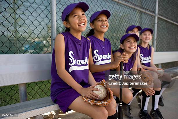 little league team in dugout - sports dugout fotografías e imágenes de stock