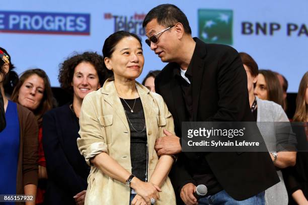 Wong Kar-wai and his wife Ye-cheng Chan aka Esther Wong attend the closing ceremony of 9th Film Festival Lumiere on October 22, 2017 in Lyon, France.