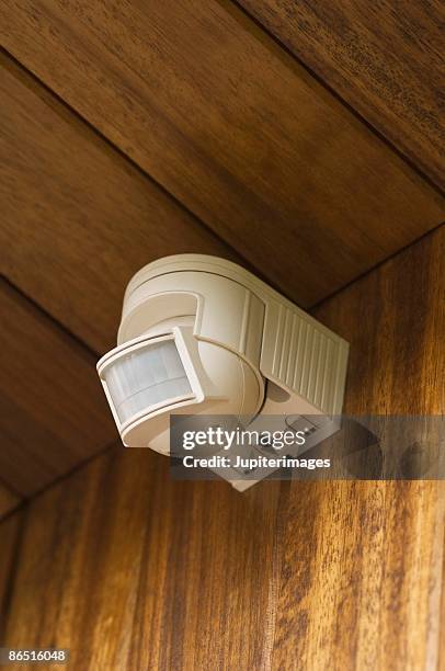 motion sensor light on wall - motion detector stock pictures, royalty-free photos & images