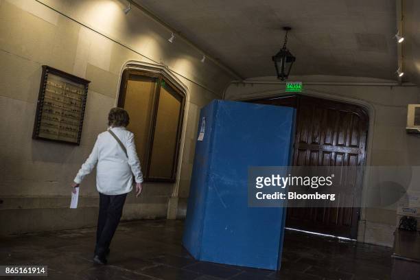 Voter walks towards a voting booth at a polling station in Buenos Aires, Argentina, on Sunday, Oct. 22, 2017. Argentines will have the opportunity to...
