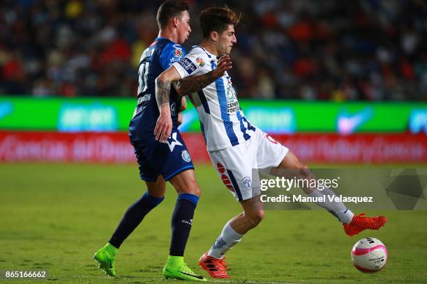 John Mondragon of Puebla defendsagainst Angelo Sagal of Pachuca during the 14th round match between Pachuca and Puebla as part of the Torneo Apertura...