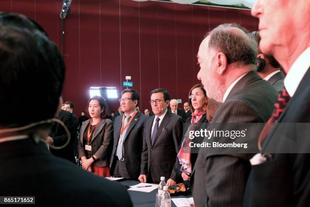 Ildefonso Guajardo Villarreal, Mexico's secretary of economy, center, stands during the Mexico Business Summit in San Luis Potosi, Mexico, on Sunday,...