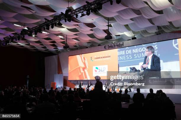 Ildefonso Guajardo Villarreal, Mexico's secretary of economy, center, participates in a panel discussion during the Mexico Business Summit in San...