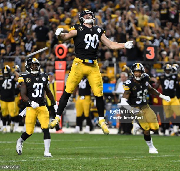 Watt of the Pittsburgh Steelers reacts after a sack of quarterback Andy Dalton of the Cincinnati Bengals in the second half during the game at Heinz...