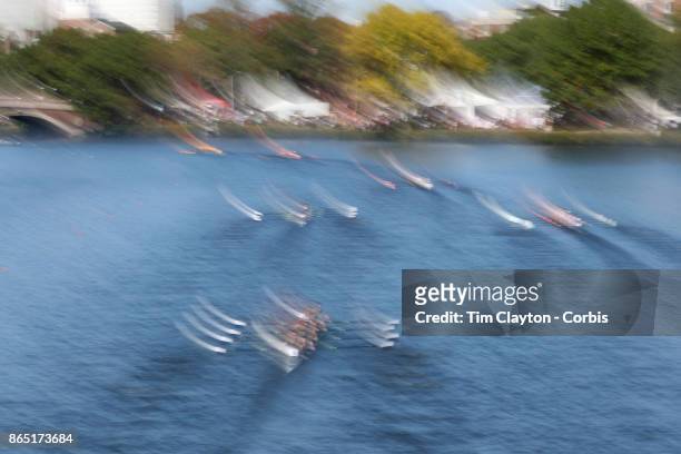 Crews in action during The 53rd Head of the Charles Regatta on the Charles River which separates Boston and Cambridge, Massachusetts, USA. The Head...