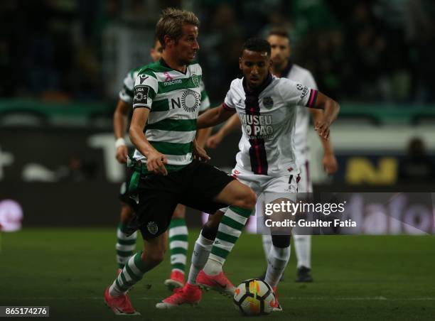 Sporting CP defender Fabio Coentrao from Portugal with GD Chaves forward Hamdou Elhouni from Lebanon in action during the Primeira Liga match between...