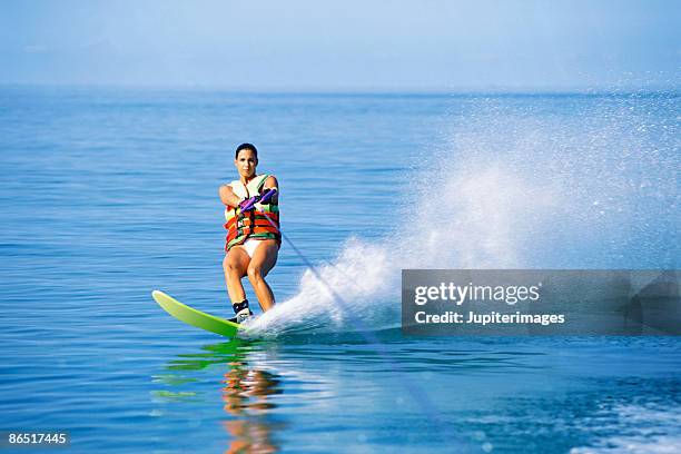 woman water-skiing - waterskiing stock pictures, royalty-free photos & images