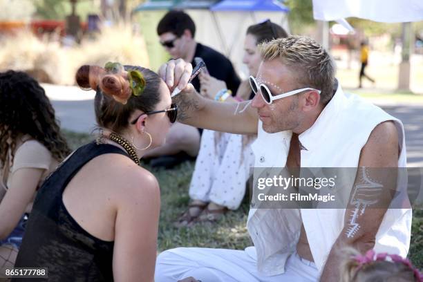 Festivalgoers get their faces painted at the Guided Meditation with Walter Yoga at The Lookout during day 3 of the 2017 Lost Lake Festival on October...