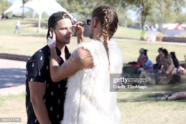 Festivalgoers get their faces painted at the Guided Meditation with Walter Yoga at The Lookout during day 3 of the 2017 Lost Lake Festival on October...