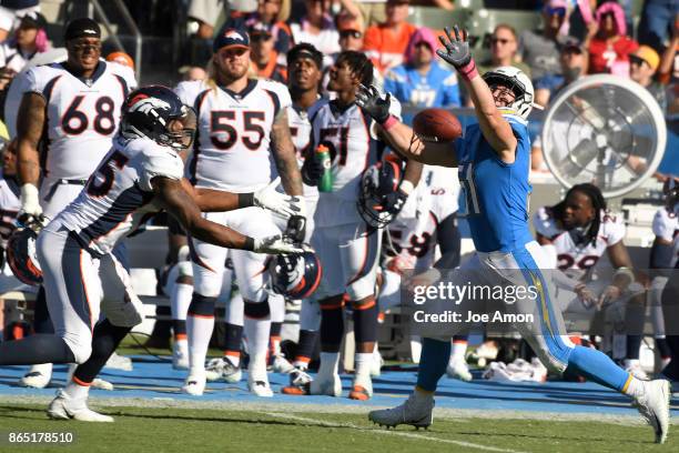 Carson, CA Outside linebacker Kyle Emanuel of the Los Angeles Chargers breaks up a pass to tight end Virgil Green of the Denver Broncos as the Denver...