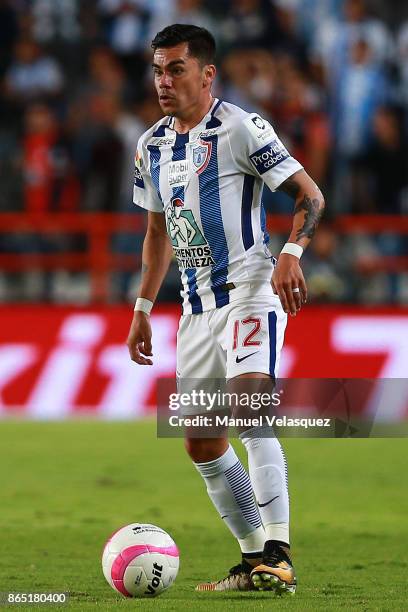 Emmanuel Garcia of Pachuca drives the ball during the 14th round match between Pachuca and Puebla as part of the Torneo Apertura 2017 Liga MX at...