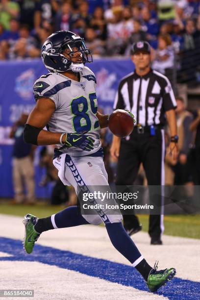 Seattle Seahawks wide receiver Doug Baldwin scores a touchdown during the third quarter of the National Football League game between the New York...