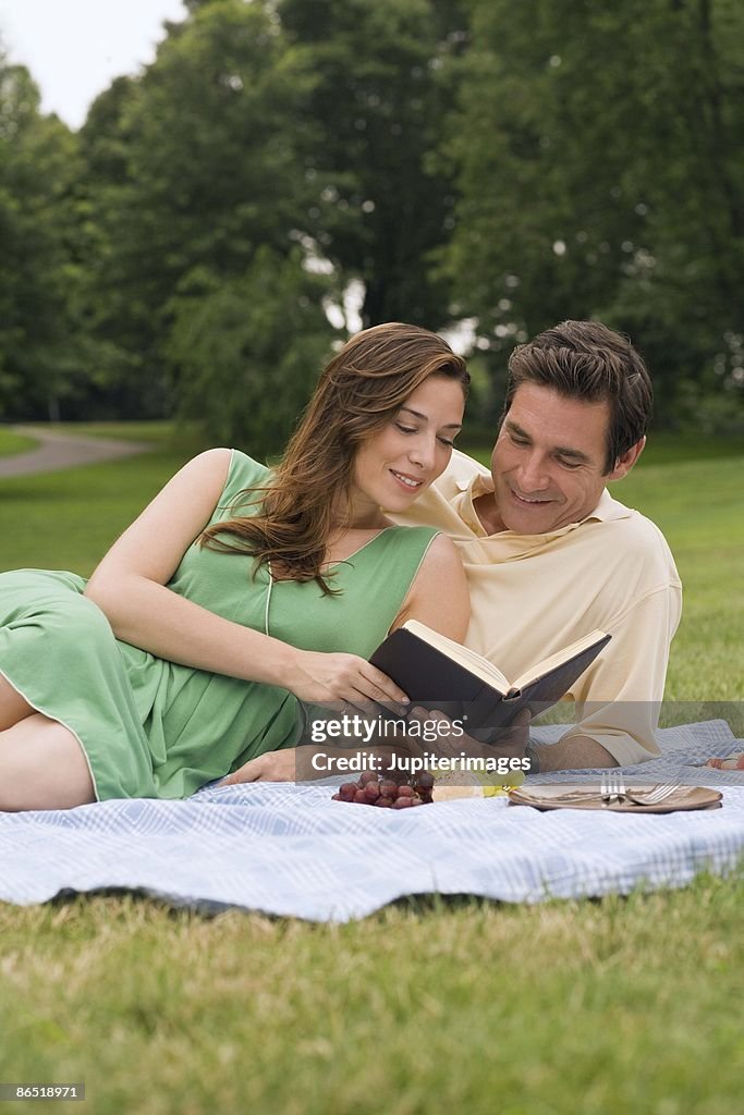 Couple relaxing at picnic