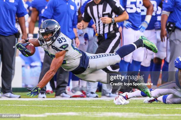 Seattle Seahawks wide receiver Doug Baldwin dives forward during the National Football League game between the New York Giants and the Seattle...