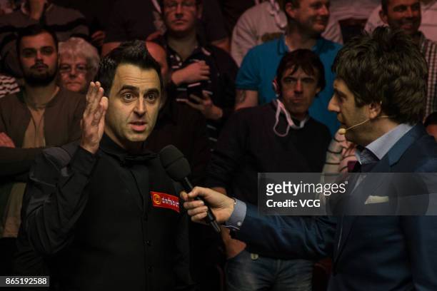 Ronnie O'Sullivan of England receives interview after winning the final match against Kyren Wilson of England on day seven of 2017 Dafabet English...