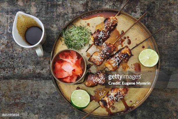 char-grilled yakitori skewers - teriyaki foto e immagini stock