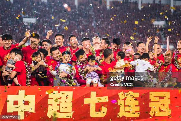 Guangzhou Evergrande Taobao F.C. Players celebrate winning the 2017 Chinese Super League title after the 28th round match between Guangzhou...