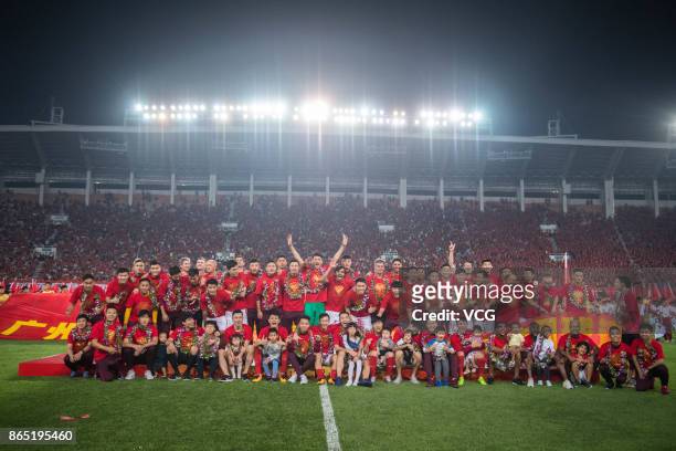 Guangzhou Evergrande Taobao F.C. Players celebrate winning the 2017 Chinese Super League title after the 28th round match between Guangzhou...
